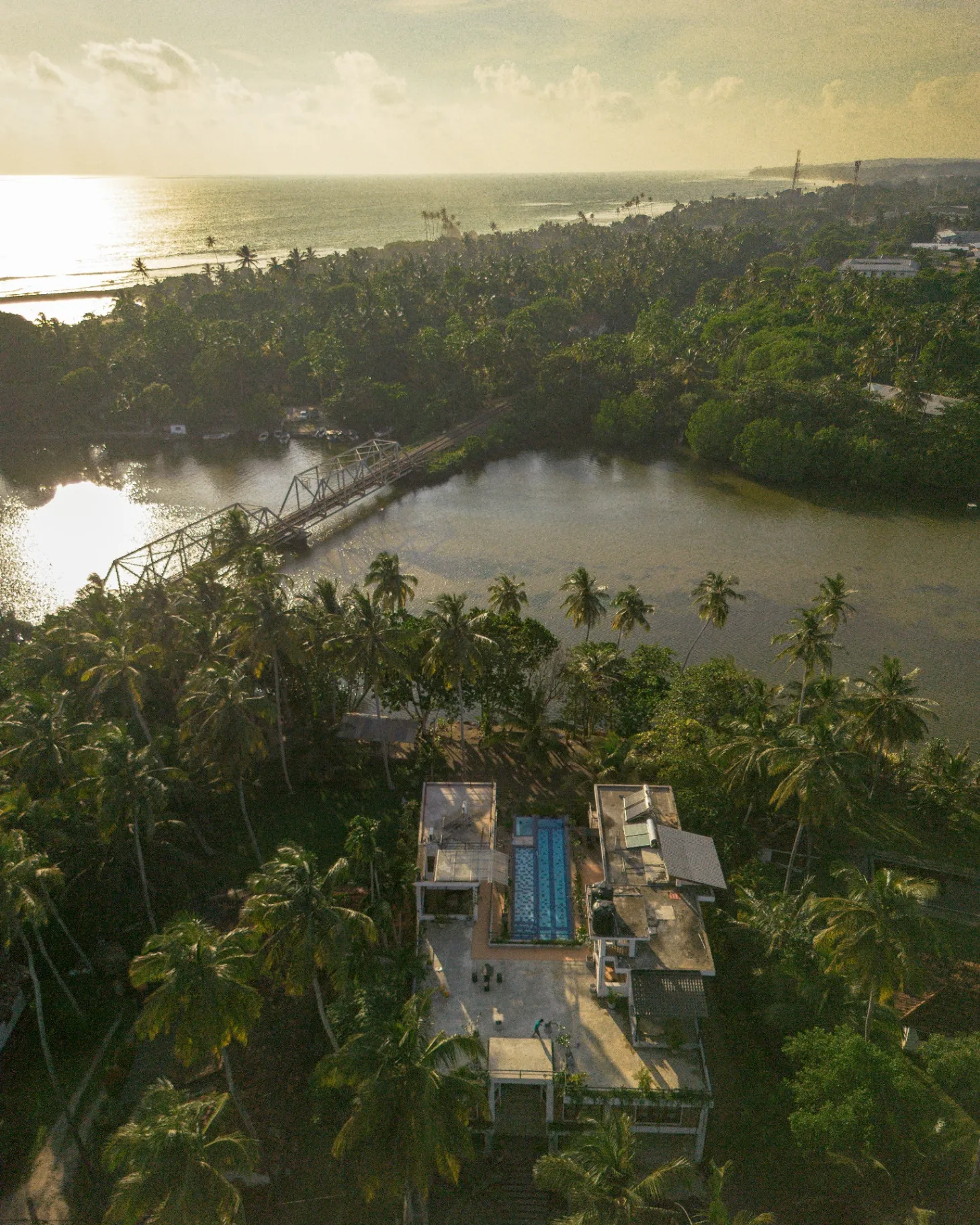 Ko Lake Villa sunset over Koggala Lake — private group retreat